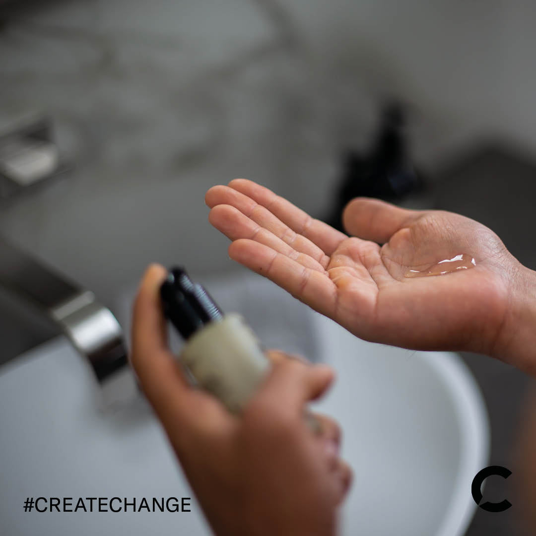 Person using CBD topical hand cream